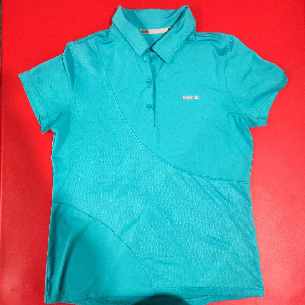 Reebok 1/4 button up polo shirt light blue women's size M